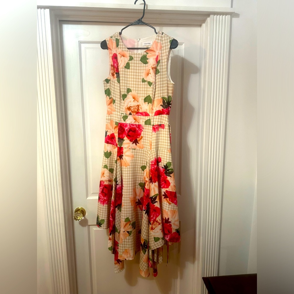 Flowered maxi dress with handkerchief hem